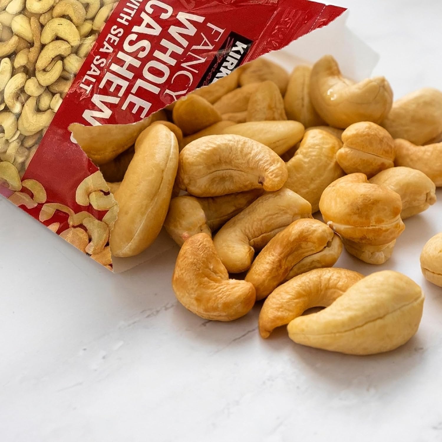 Kirkland Fancy Whole Cashews - Kirkland's Finest Selection of Large Whole Cashews Lightly Salted - Unforgettable Flavor Experience Cashew Nuts - 40oz Premium Cashew Snacks